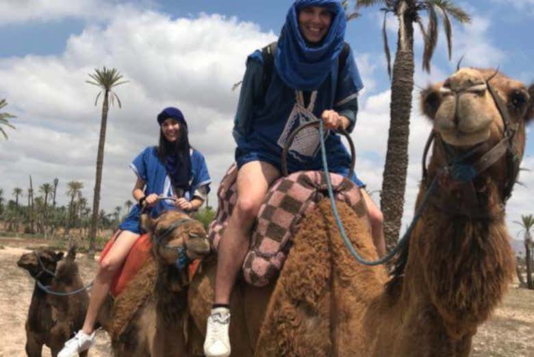 Riding a camel on the tour in the desert around Marrakech